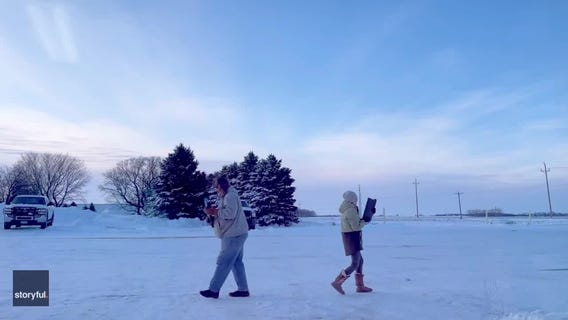 Minnesota grandparents icy water pistol duel