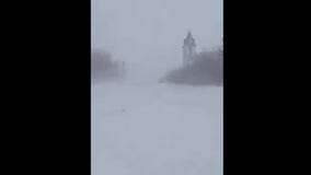 Motorists navigate whiteout conditions during North Dakota blizzard