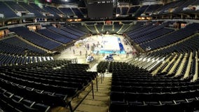 Time lapse of crews installing floor for NCAA Women's Final Four
