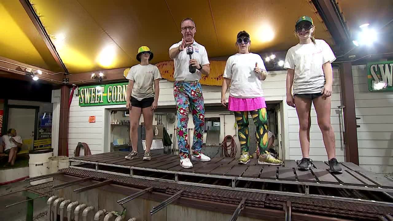 Ian Leonard rocks the corn roaster for the 2022 Corn Dance