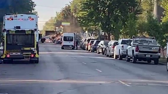 Minneapolis city workers clear homeless encampment by the Greenway