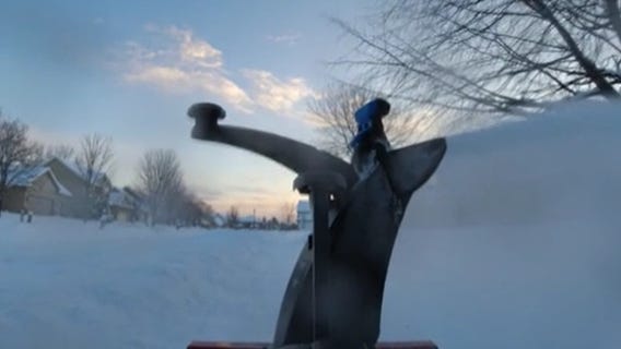 Snow blowing in Champlin following Wednesday's storm: RAW