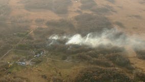 Crews battle fire at Carlos Avery Wildlife Management Area