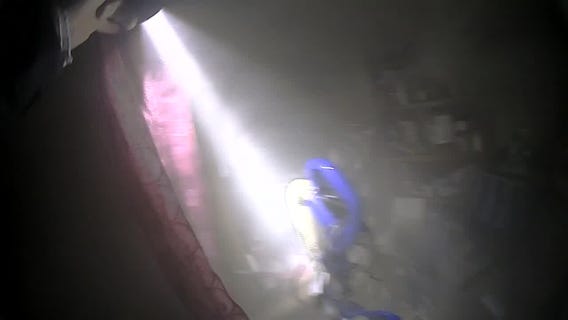 Sauk Centre police rescue woman from burning home