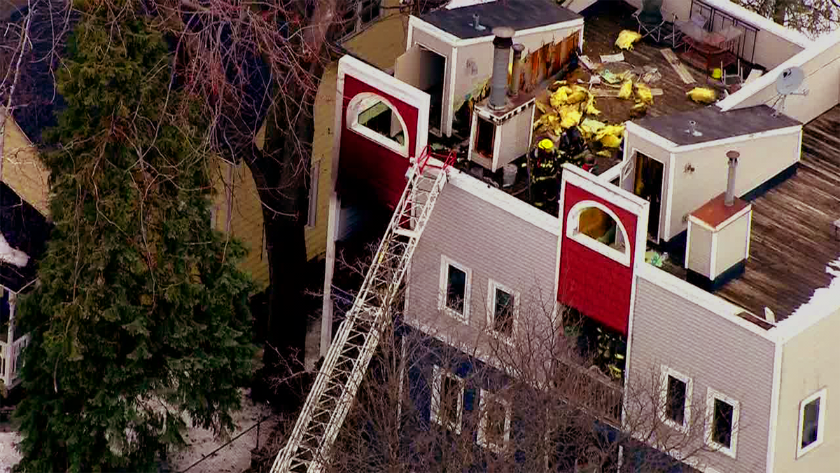 Crews battle 2-alarm fire at Minneapolis townhome