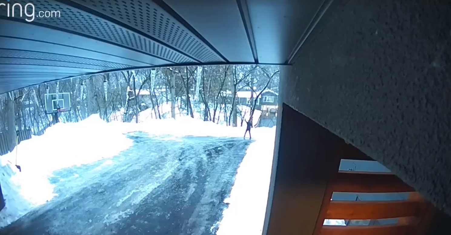 It's slick out there! Father slides down icy road in Bloomington