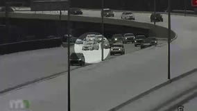 Drivers push stuck vehicles up ramp onto I-394