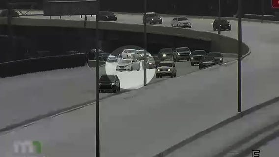 Drivers push stuck vehicles up ramp onto I-394