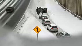 Minnesota drivers hand-shovel Highway 100 to clear traffic jam