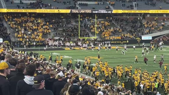 Gophers celebrate after beating Iowa 12-10