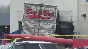 Semi truck crashes in dentist's office