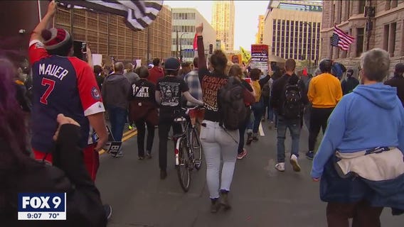 Protesters march following first day of witness testimony in Chauvin trial