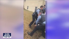 Activists call for termination of officers after video of alleged punch surfaces