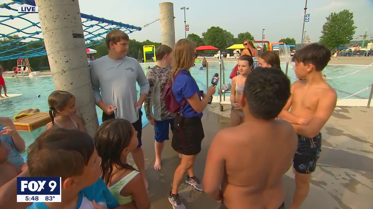 Kids hit the pool during Town Ball Tour in Faribault