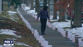 Thousands of luminaries light up Hopkins neighborhood on Christmas Eve