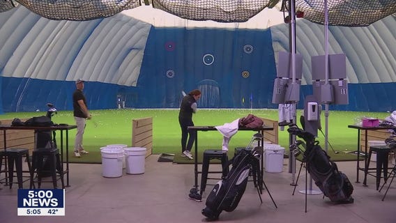 Golf fans find escape from spring weather in Edina