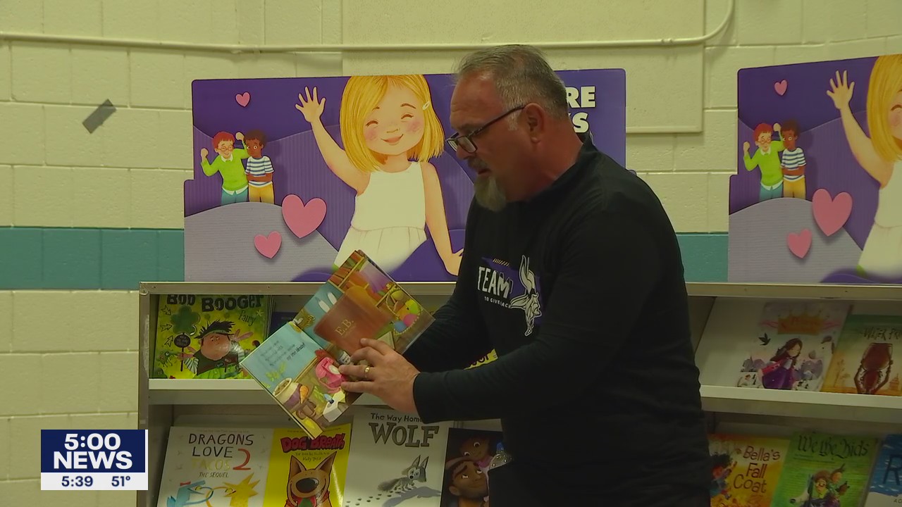 Vikings put down playbooks to visit St. Paul school's book fair