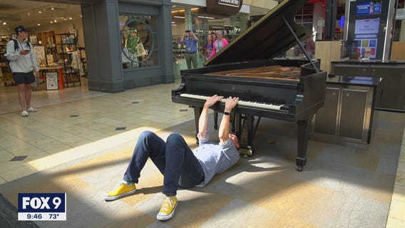 MSP airport piano player delights travelers with upside down playing
