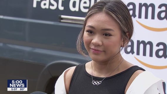 Olympic champion Suni Lee surprises students at St. Paul school