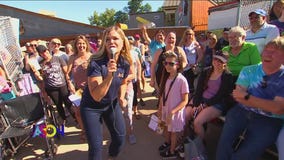 Child gets real with Kendall and Jason at the Minnesota State Fair