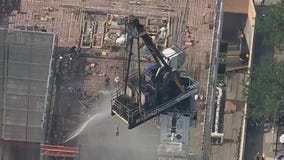 Crane collapses on building in NYC