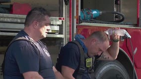 Fire crews battles flames in blazing heat