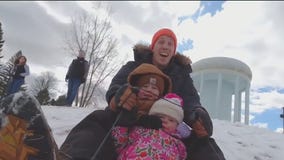 MN families enjoy spring snowfall