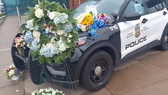 Growing memorial for slain MPD Officer Jamal Mitchell