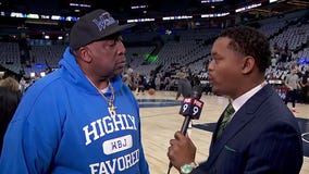 Ahmad Hicks talks with Karl Towns Sr. ahead of Game 5