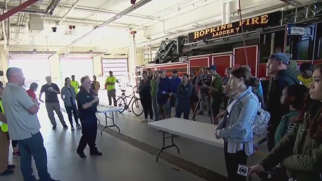 Volunteers search for missing boy in Hopkins