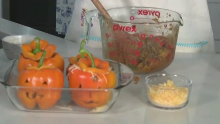 Jack-o'-lantern stuffed peppers recipe