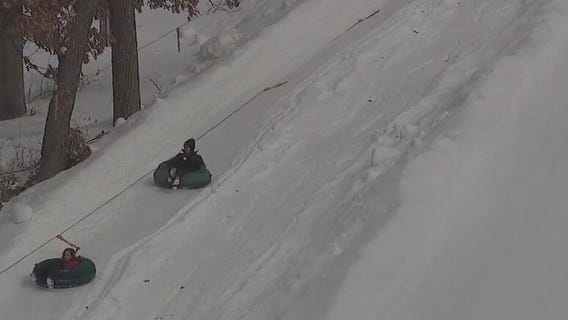 Minnesotans outside to enjoy the newly fallen snow