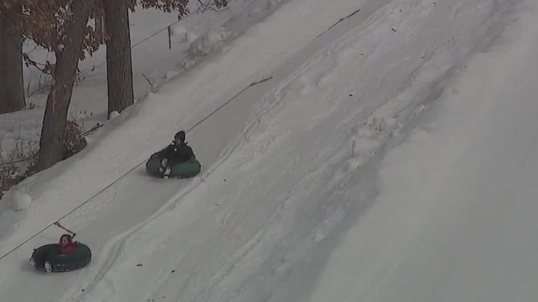 Minnesotans outside to enjoy the newly fallen snow