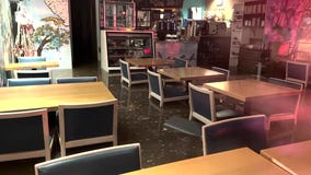 Water main break floods flower shop, restaurant