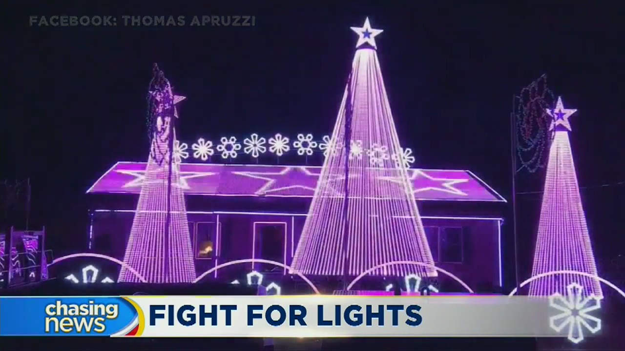 Man vows to keep light display despite mayor's demand for fees