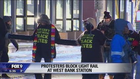 Protesters block light rail tracks near U.S. Bank Stadium