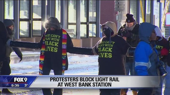 Protesters block light rail tracks near U.S. Bank Stadium