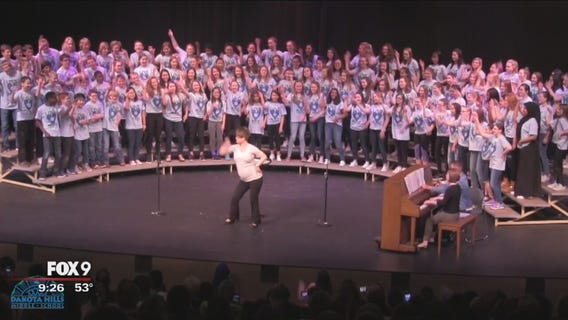 Eagan teacher grooves on stage while nine months pregnant