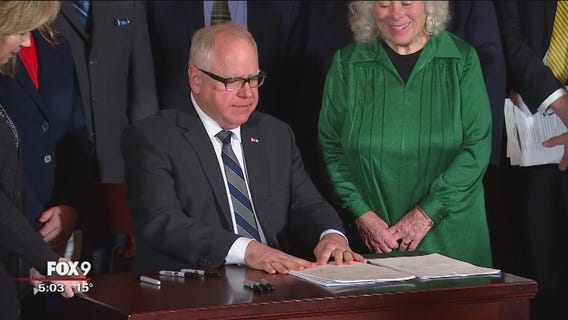 Walz signs first bills, OKs millions for MNLARS
