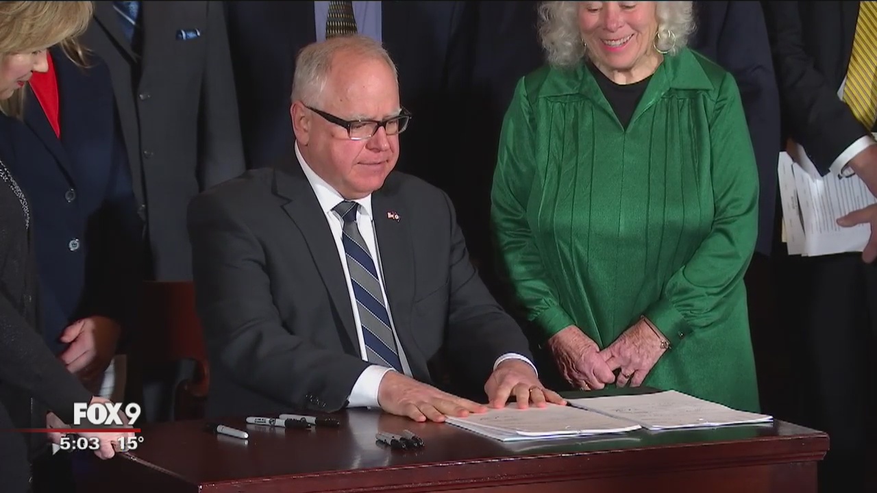 Walz signs first bills, OKs millions for MNLARS