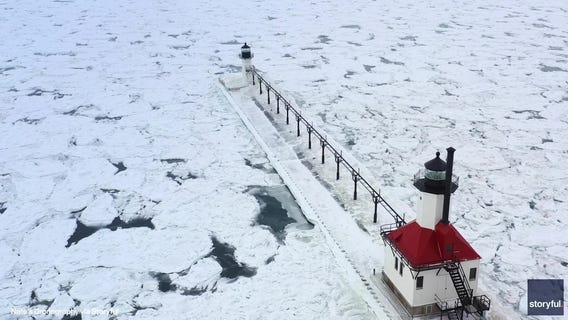 Beautiful drone footage of ice covered Lake Michigan