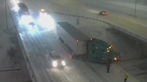 Semi teetering on edge of bridge in MN