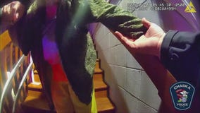 WATCH: Chaska police officer saves woman from fire