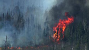 Crews battle twin wildfires in northern MN