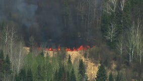 Twin wildfires burn in northern Minnesota [AERIALS]