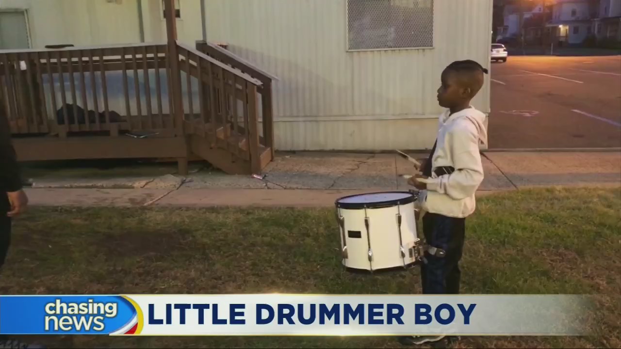 9-year-old drummer keeps the beat with high school marching band