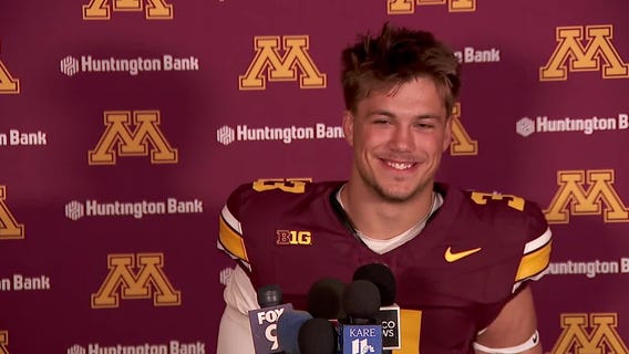 Koi Perich wears WWE belt at Gophers media day