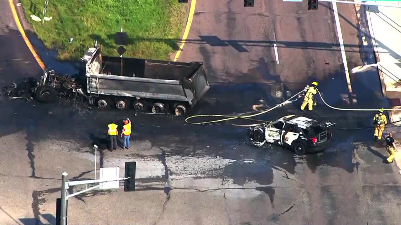 Shakopee police squad hits semi-truck on County Road 101 (AERIALS)