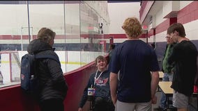Quadriplegic MN hockey player reunites with team