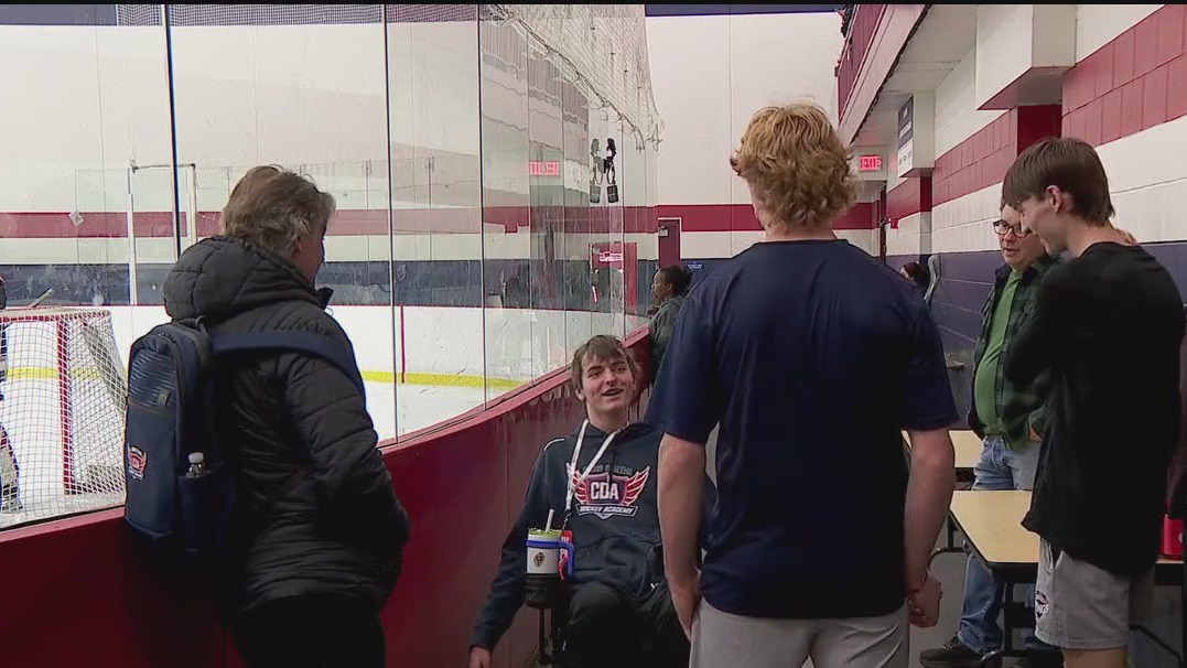 Quadriplegic MN hockey player reunites with team